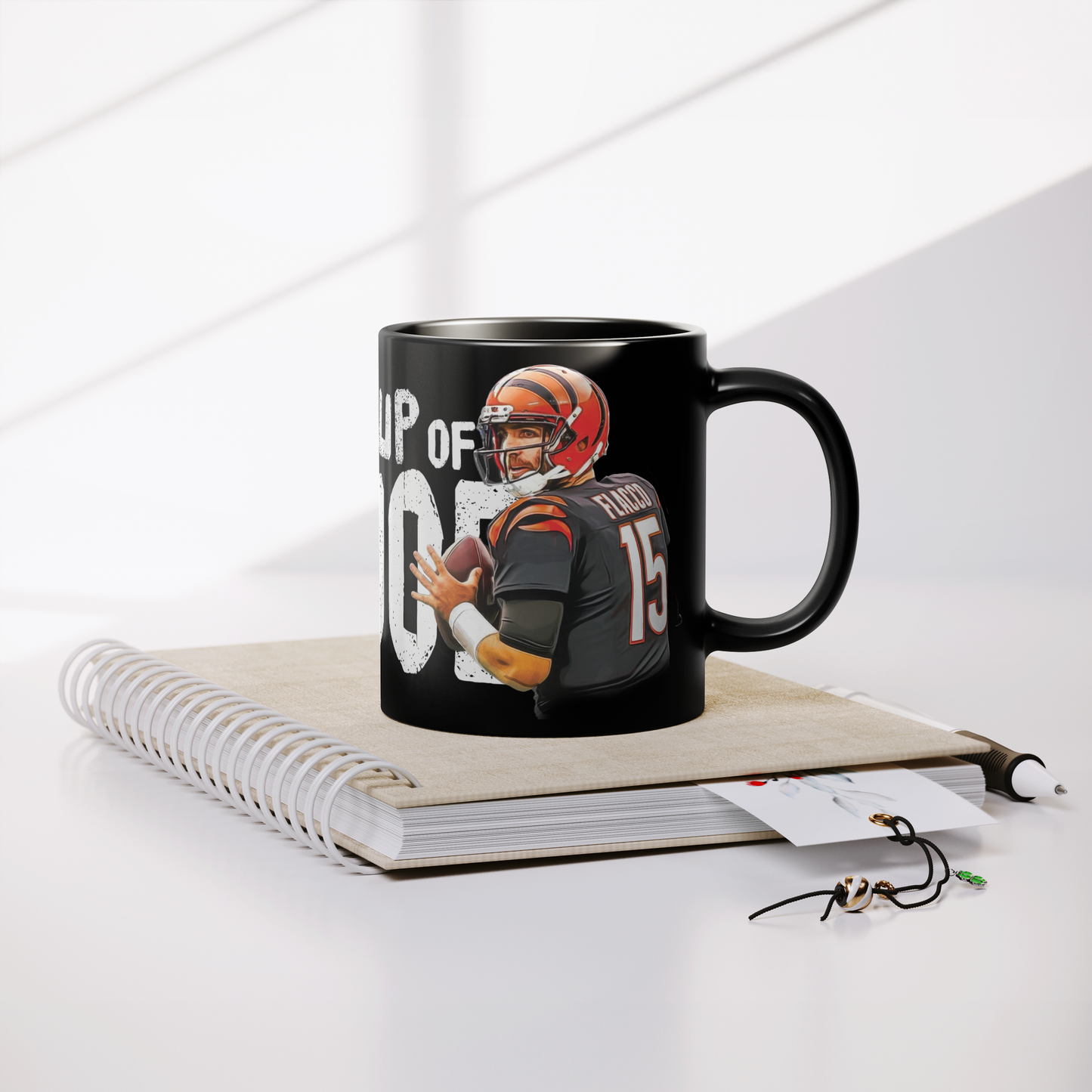 Cup_of_Flacco_Black__11oz_Lifestyle_Notebook_Mockup.png